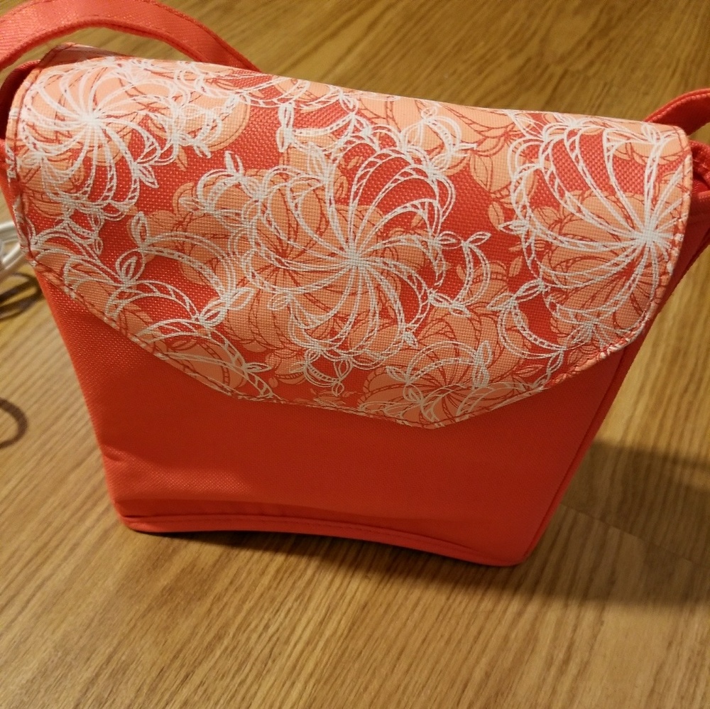 Heated hair curlers with attached coral bag